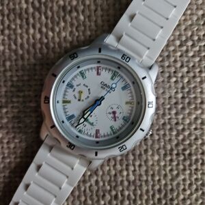 Casio Silver and White Analog Watch